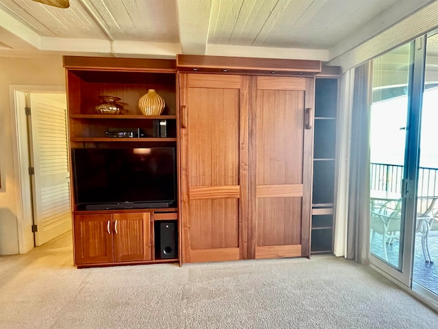 unfurnished living room with light carpet