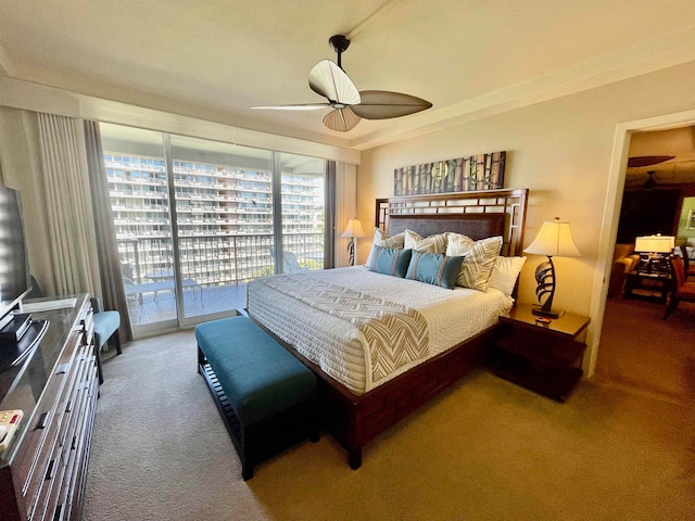 bedroom featuring ceiling fan, access to exterior, and carpet