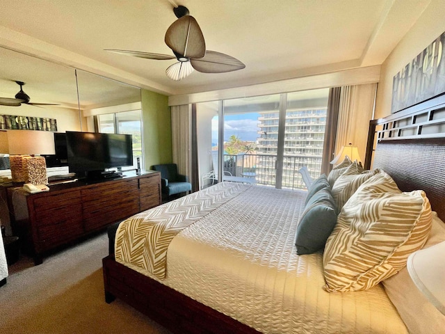 bedroom with ceiling fan, access to outside, and carpet