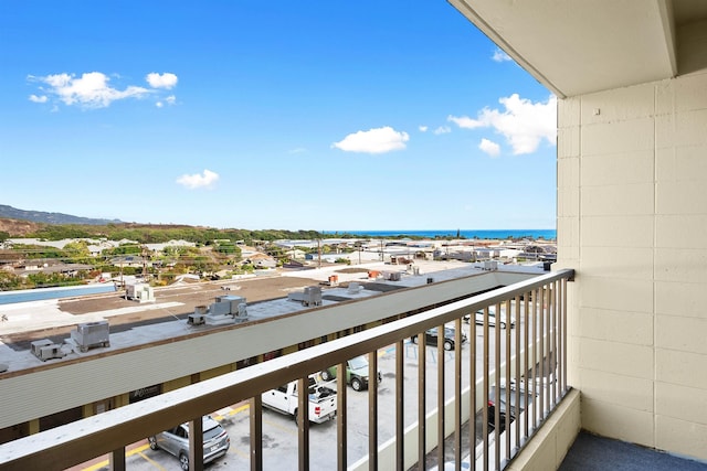 balcony featuring a water view