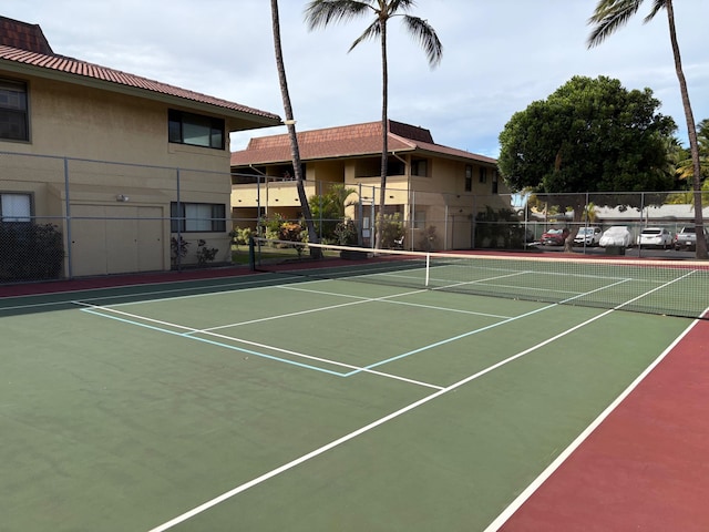 view of tennis court featuring basketball court