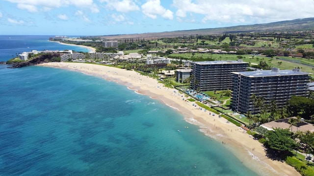 bird's eye view featuring a city view, a beach view, and a water view