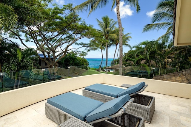 view of patio / terrace with a water view