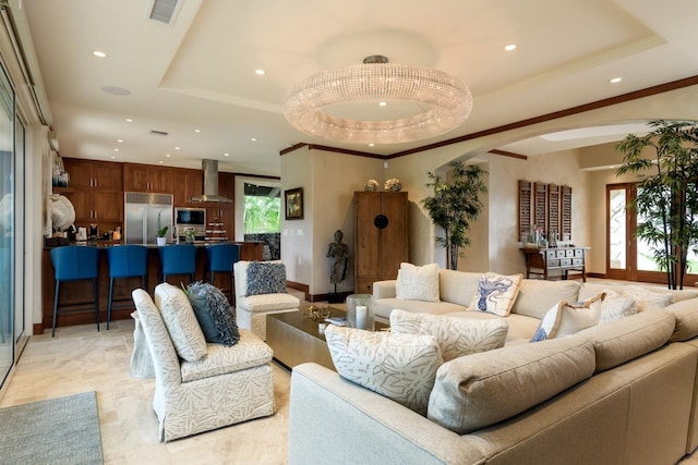 living room with a raised ceiling