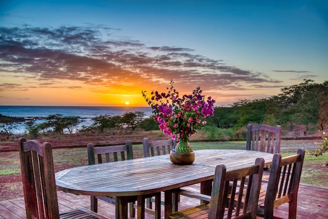 deck at dusk with a water view