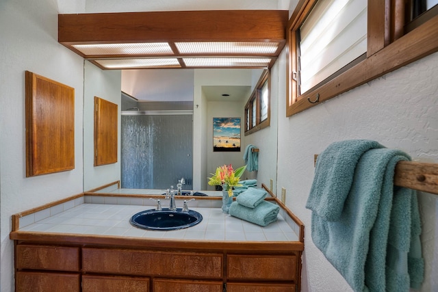 bathroom featuring oversized vanity