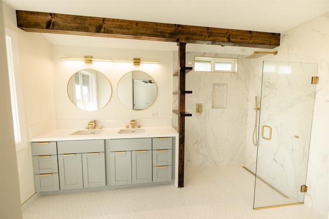 full bath featuring a sink, beamed ceiling, a marble finish shower, and double vanity