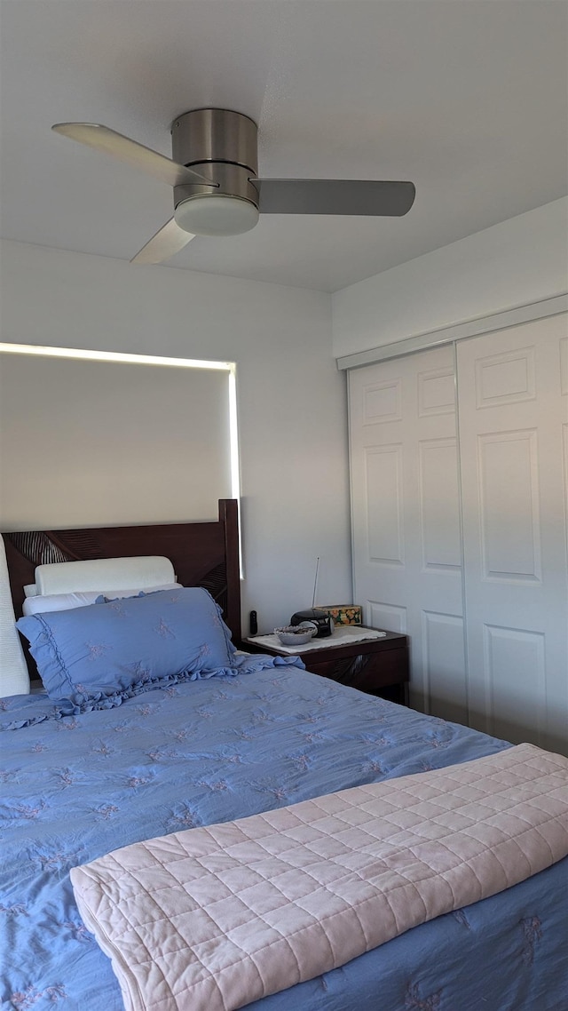 bedroom with a closet and ceiling fan