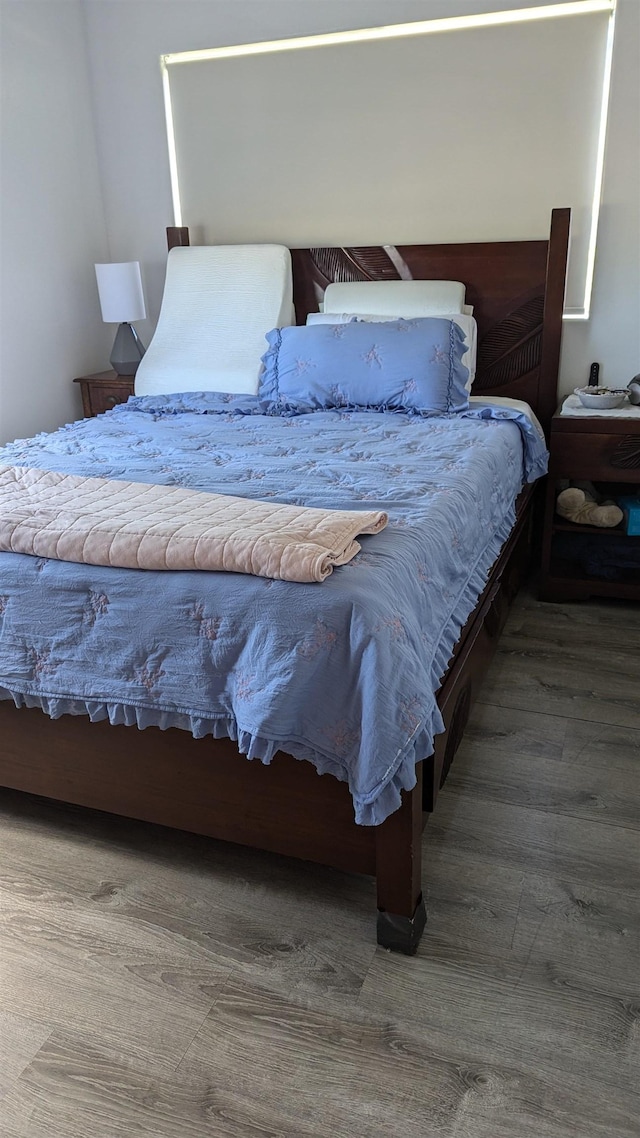 bedroom featuring hardwood / wood-style floors