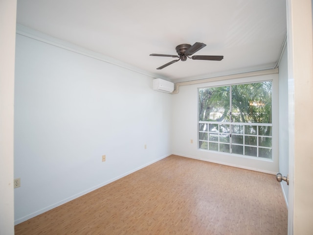 spare room with ornamental molding, a wall mounted air conditioner, and hardwood / wood-style floors