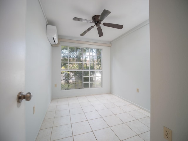 tiled spare room featuring ceiling fan, a wall unit AC, and crown molding