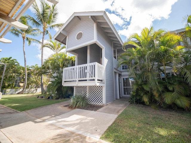 160 Keonekai Rd Unit 14-102, Kihei, HI 96753 - view of side of property with a lawn