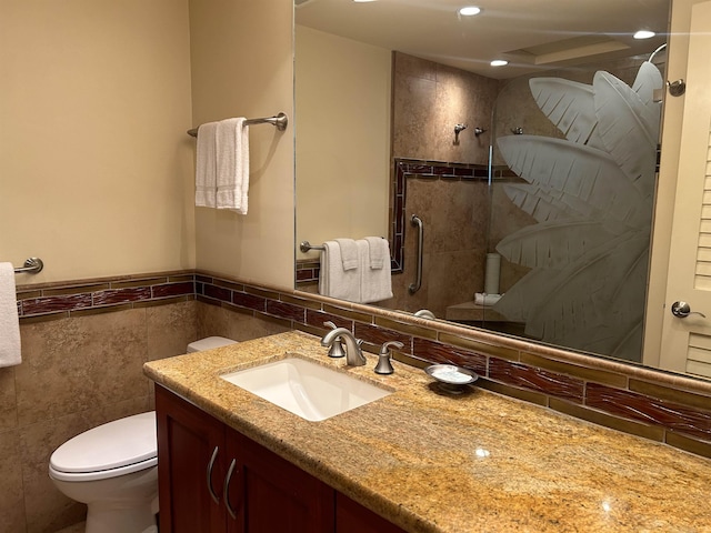 2481 Kaanapali Pkwy Unit 101A, Lahaina, HI 96761 - full bath with toilet, tile walls, tiled shower, vanity, and a wainscoted wall