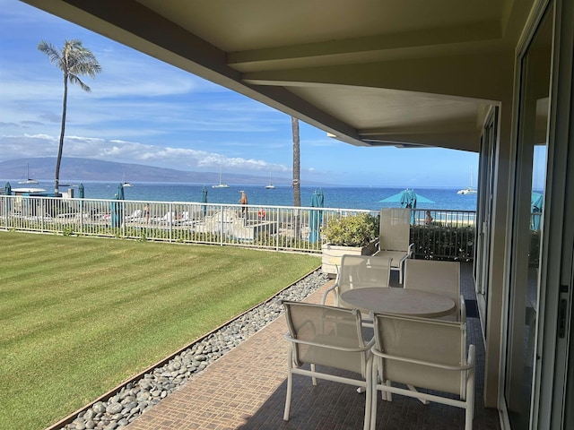 2481 Kaanapali Pkwy Unit 101A, Lahaina, HI 96761 - view of grassy yard featuring a water view and a balcony