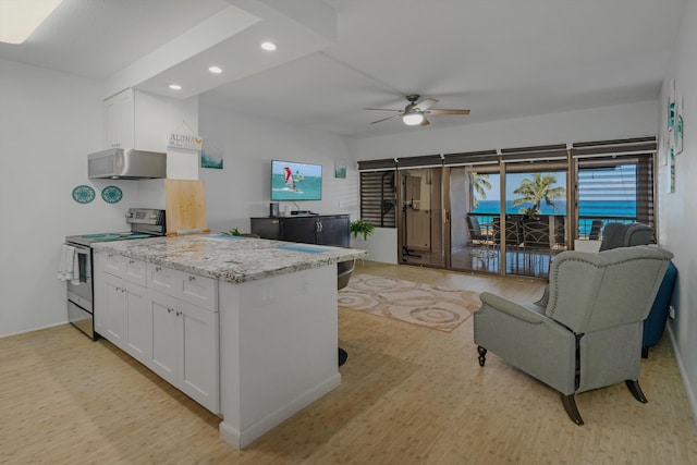 kitchen with white cabinets, light wood-type flooring, stainless steel electric range oven, and exhaust hood