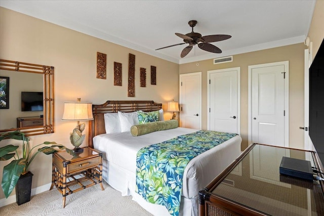 bedroom featuring ornamental molding and ceiling fan