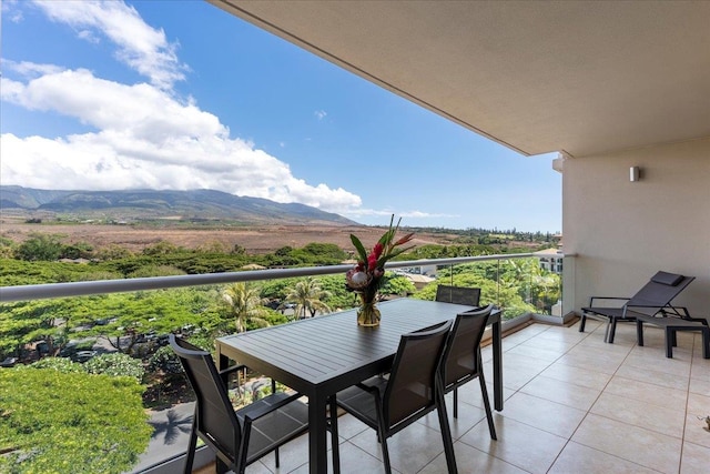 balcony featuring a mountain view