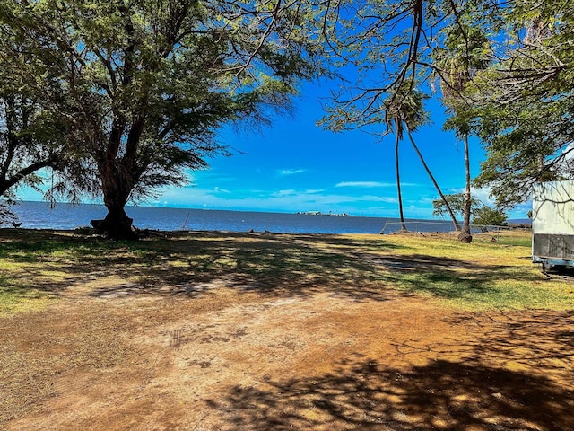 exterior space with a water view