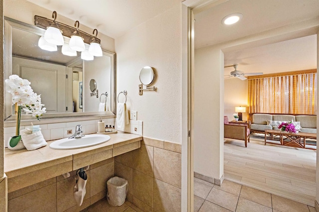 4327 Lower Honoapiilani Rd Unit 101B, Lahaina, HI 96761 - bathroom with a sink, a ceiling fan, and tile patterned floors