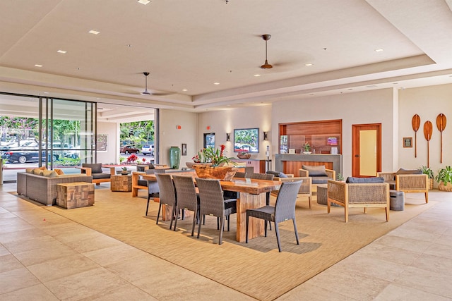 4327 Lower Honoapiilani Rd Unit 101B, Lahaina, HI 96761 - dining room featuring a raised ceiling, light tile patterned flooring, and recessed lighting