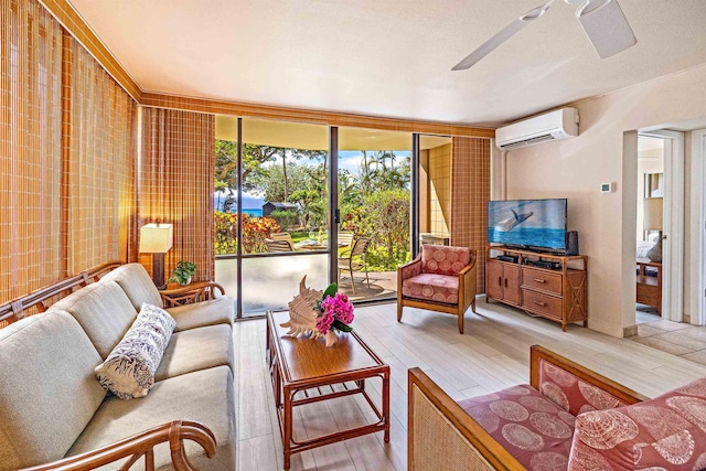 4327 Lower Honoapiilani Rd Unit 101B, Lahaina, HI 96761 - living room featuring an AC wall unit, light wood-type flooring, floor to ceiling windows, and a ceiling fan