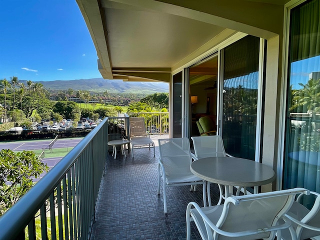 balcony featuring a mountain view