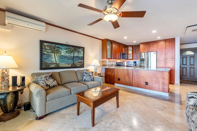 living room with a wall mounted AC and ceiling fan