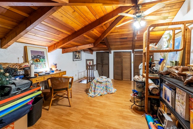 home office with light wood-type flooring, vaulted ceiling with beams, ceiling fan, and wooden ceiling