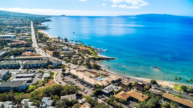 drone / aerial view featuring a water view