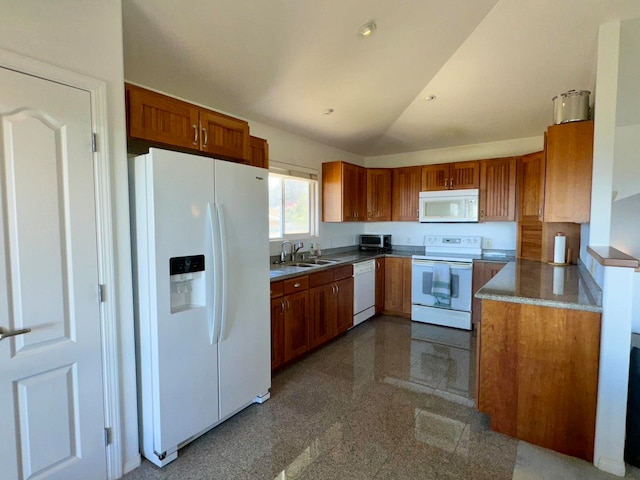 kitchen with lofted ceiling, sink, and white appliances