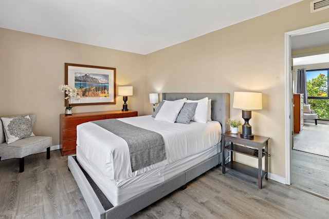 bedroom featuring hardwood / wood-style flooring