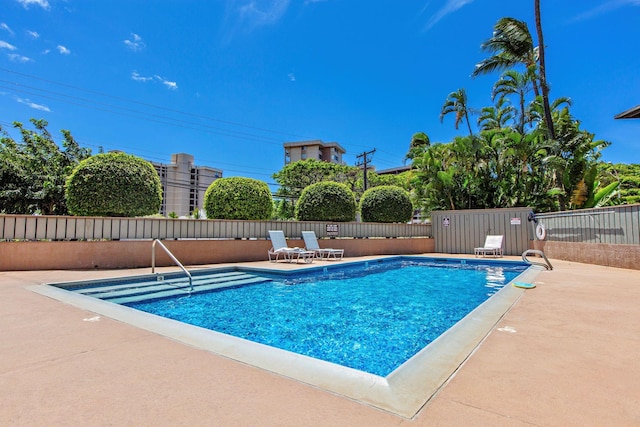 view of swimming pool featuring a patio