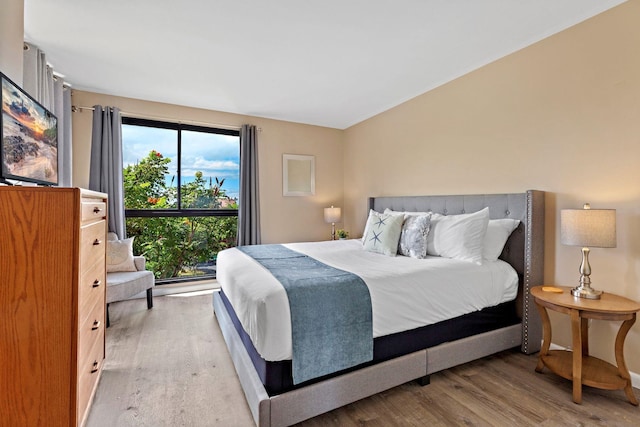 bedroom with light wood-type flooring