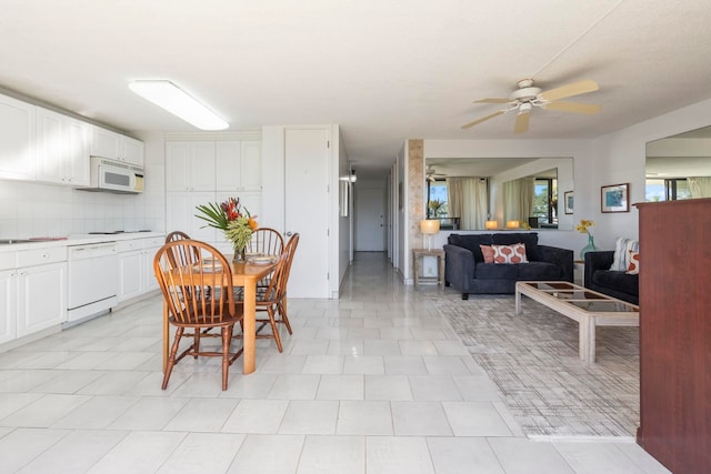 dining space with ceiling fan