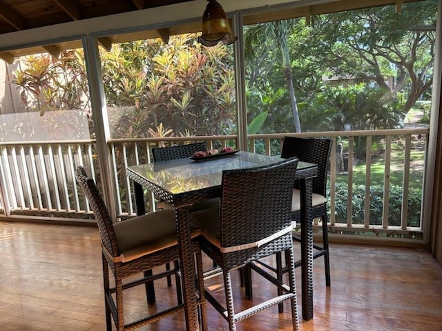 sunroom / solarium with beam ceiling