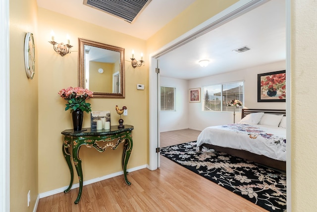 bedroom featuring light hardwood / wood-style floors