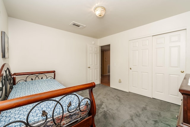 carpeted bedroom featuring a closet