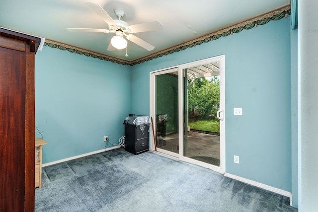 empty room with carpet and ceiling fan