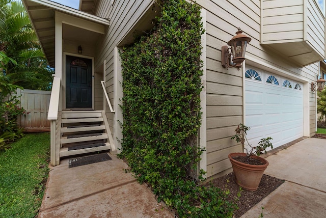 entrance to property featuring a garage