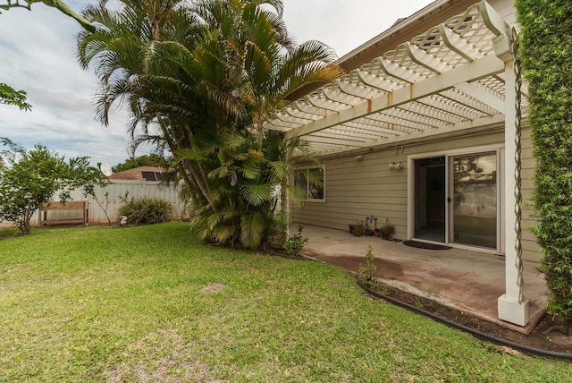 view of yard with a pergola and a patio area