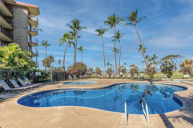 view of pool featuring a community hot tub