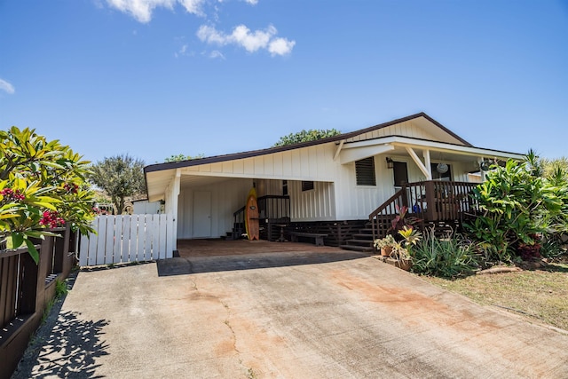 250 Kahiko St, Paia, HI 96779 - manufactured / mobile home featuring driveway, a porch, and an attached carport