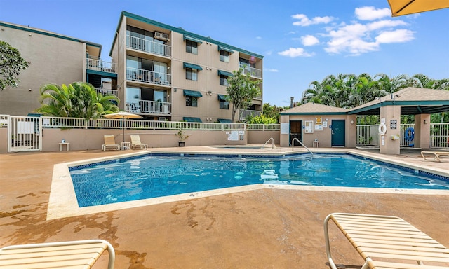 view of swimming pool with a gazebo and a patio