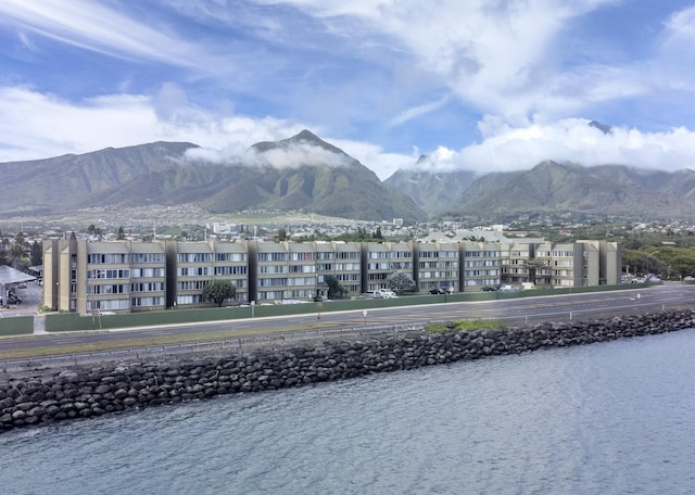 view of mountain feature with a water view