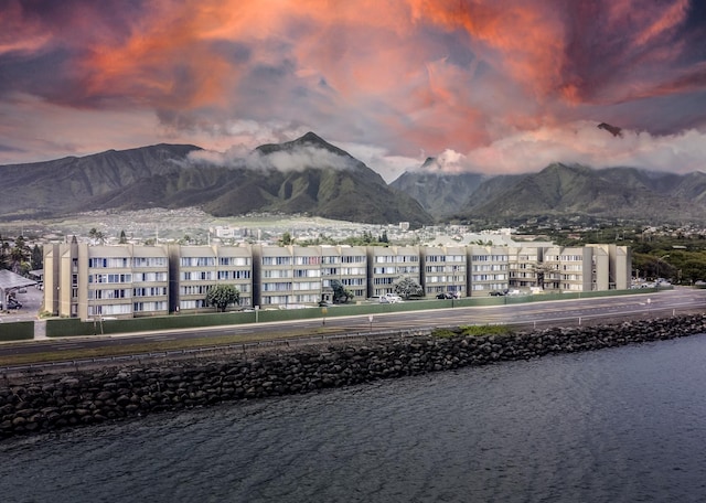 view of mountain feature featuring a water view