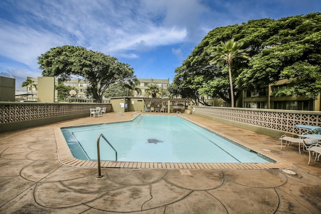 pool featuring a patio