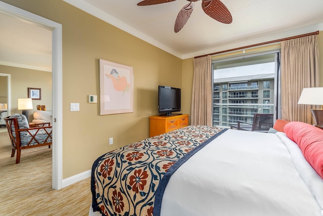 bedroom featuring ceiling fan, light carpet, and ornamental molding