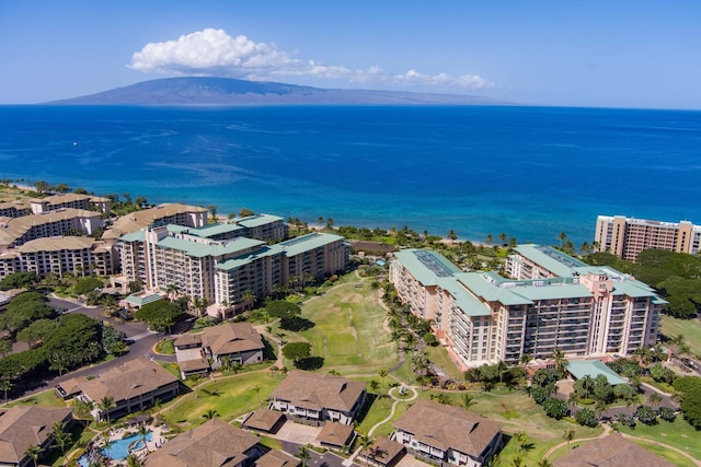 drone / aerial view with a water and mountain view