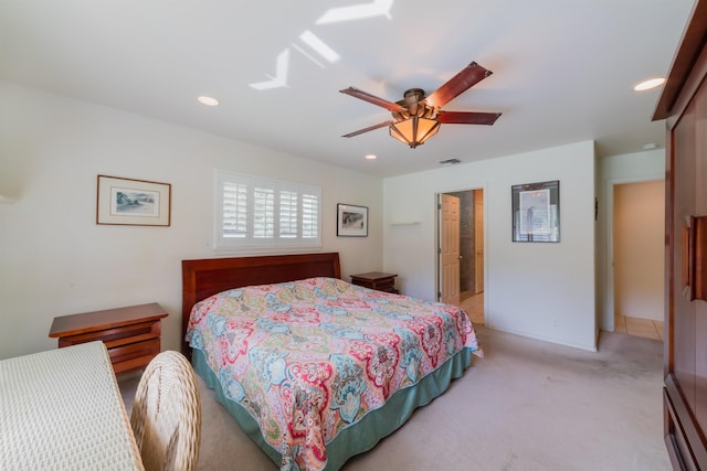 carpeted bedroom with ceiling fan