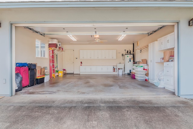 garage with water heater and sink